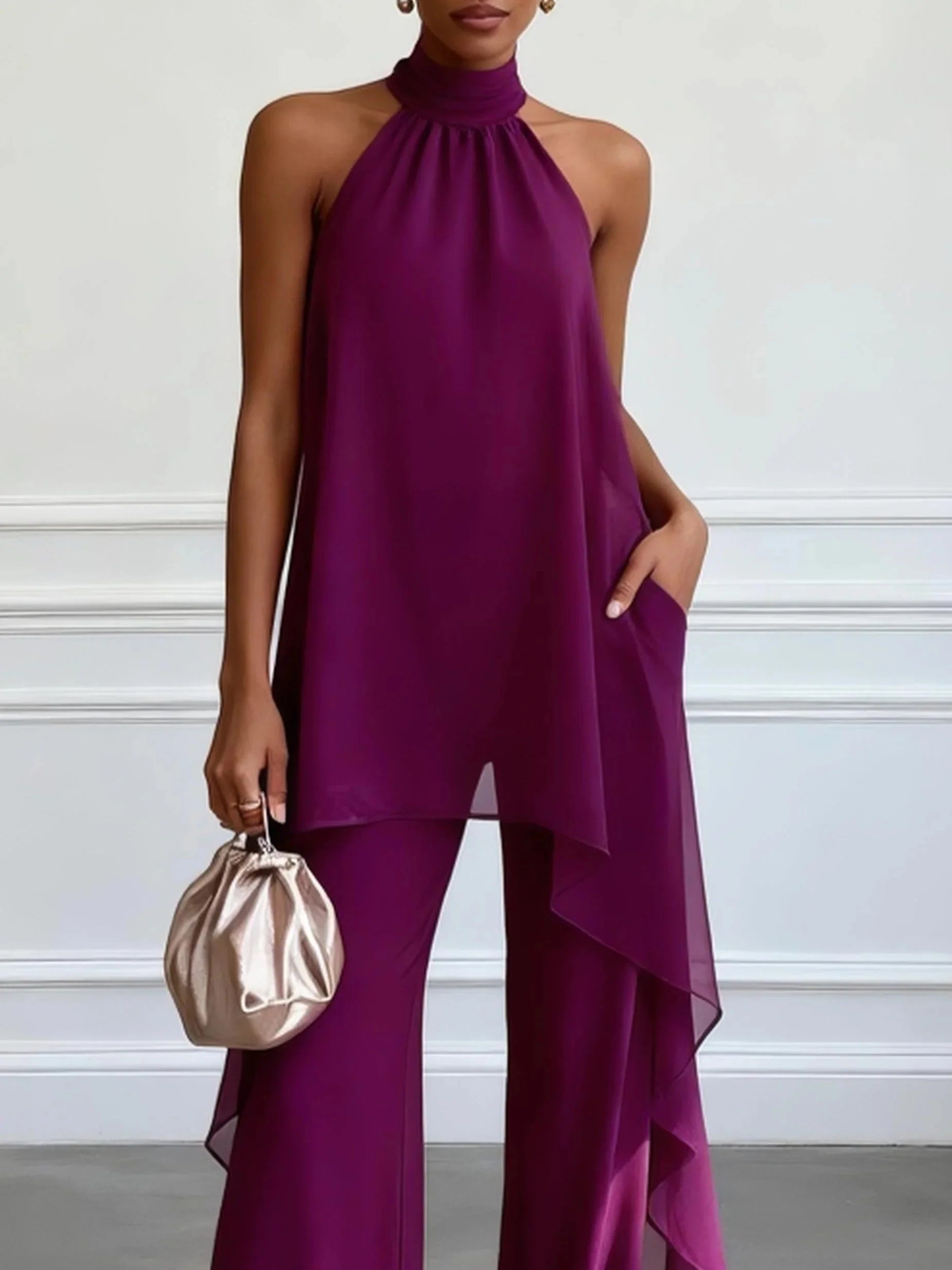 Completo due pezzi con top elegante viola allacciato al collo senza maniche e pantaloni