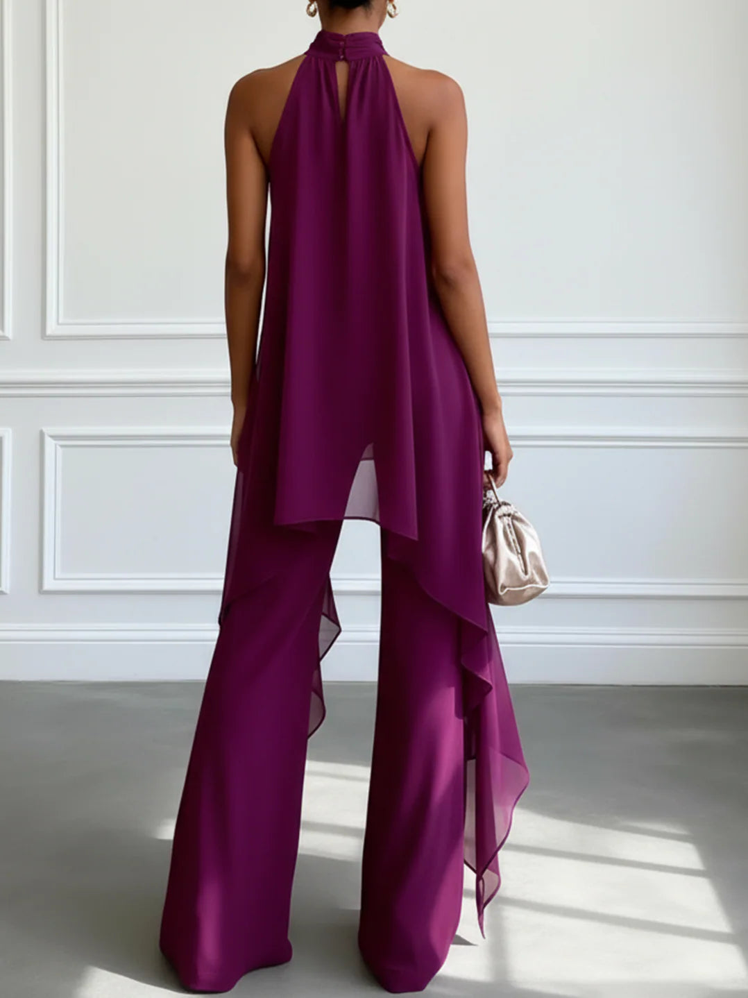 Completo due pezzi con top elegante viola allacciato al collo senza maniche e pantaloni
