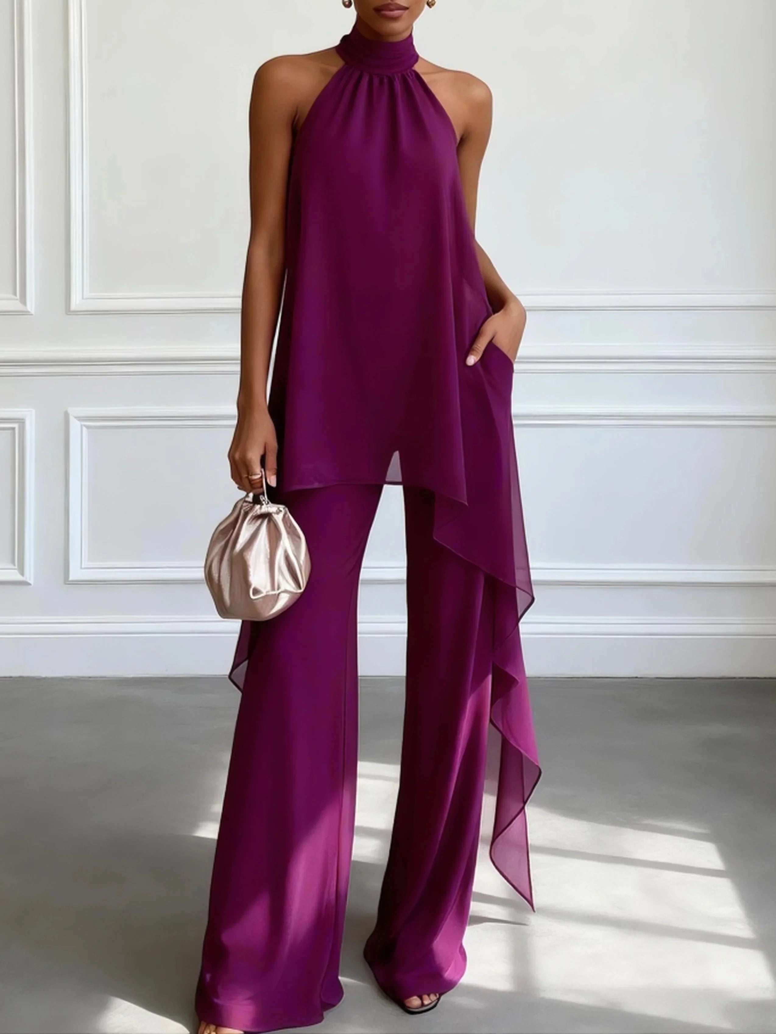 Completo due pezzi con top elegante viola allacciato al collo senza maniche e pantaloni